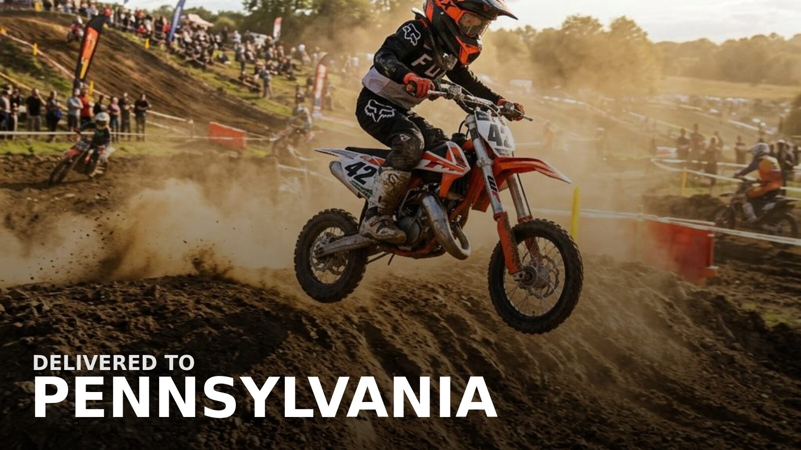 New powersports delivered to Pennsylvania — a dirt bike on a wooded ridge trail in fall color